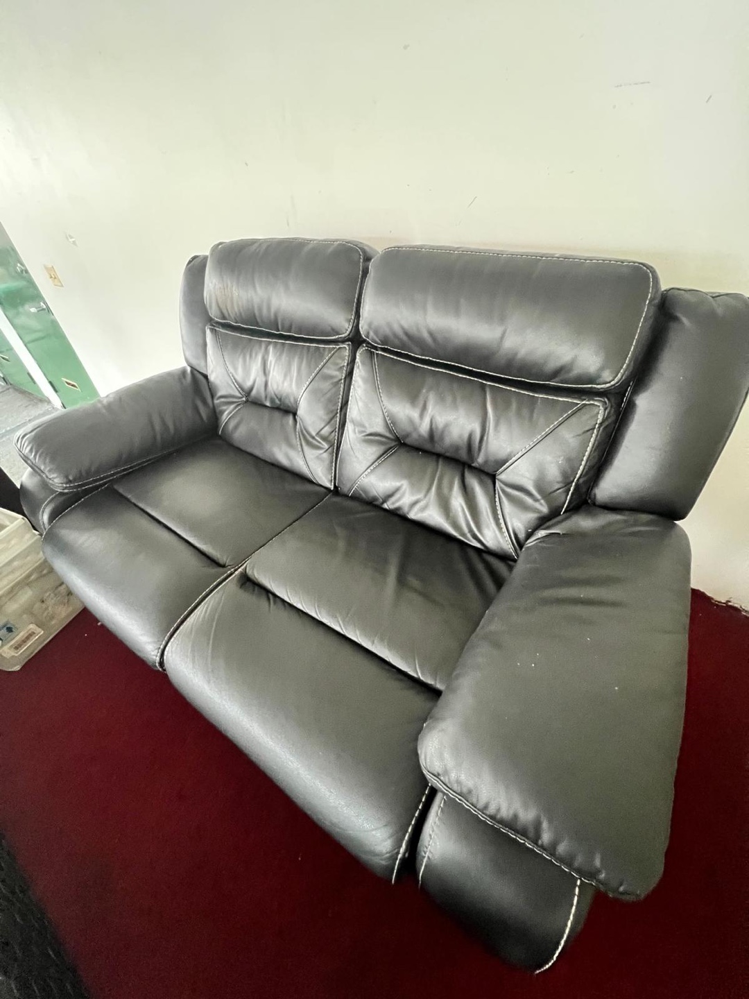 Black Leather Reclining Loveseat
