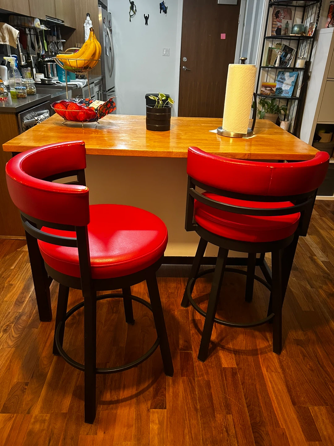 Kitchen Island with Two Red Bar Stools
