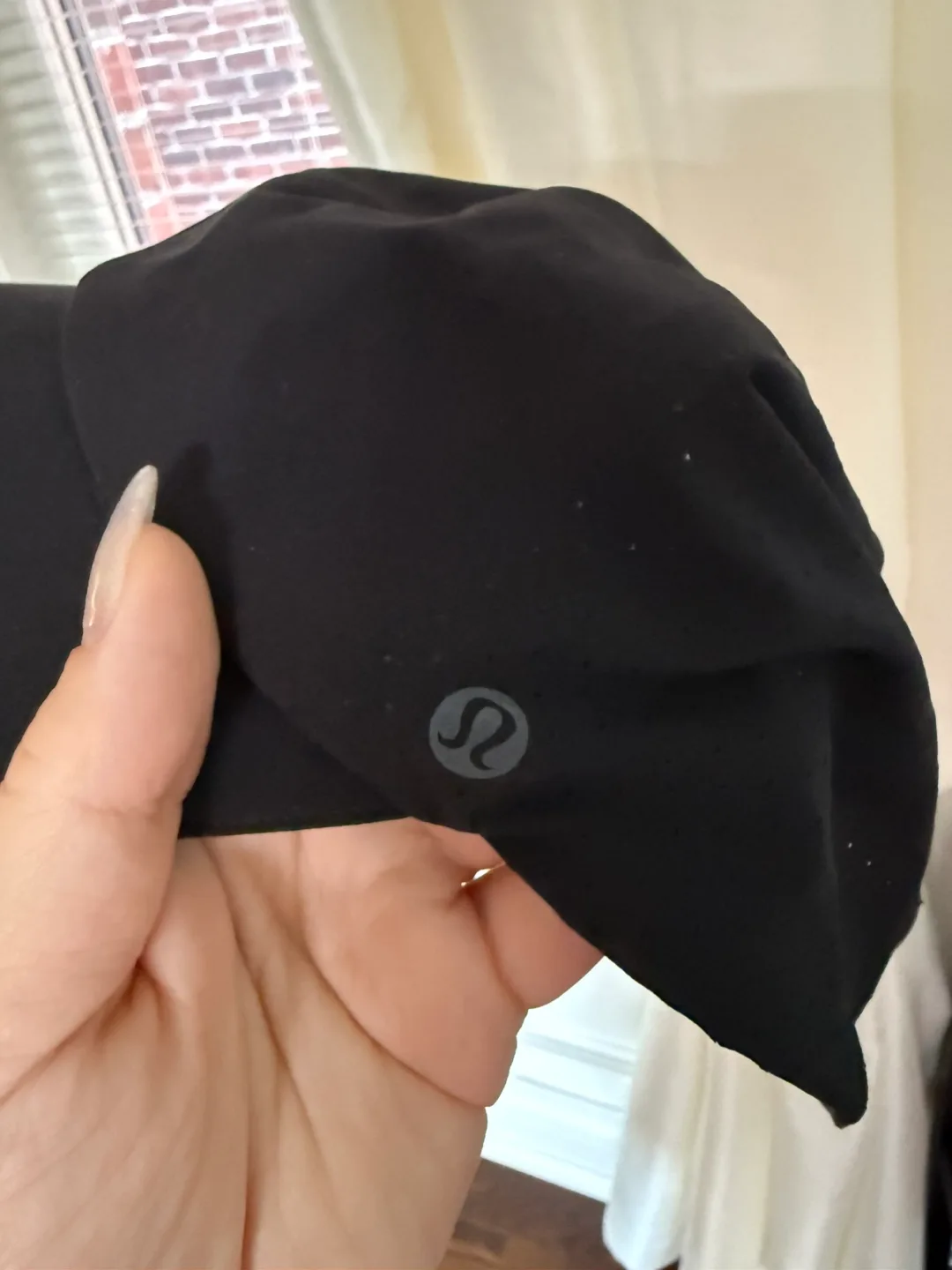 Brand new Lululemon running cap never used image indicator(4)
