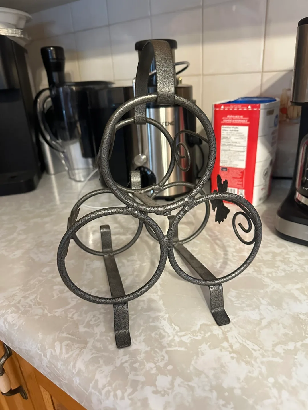 Metal Wine Rack with Leaf Design thumbnail