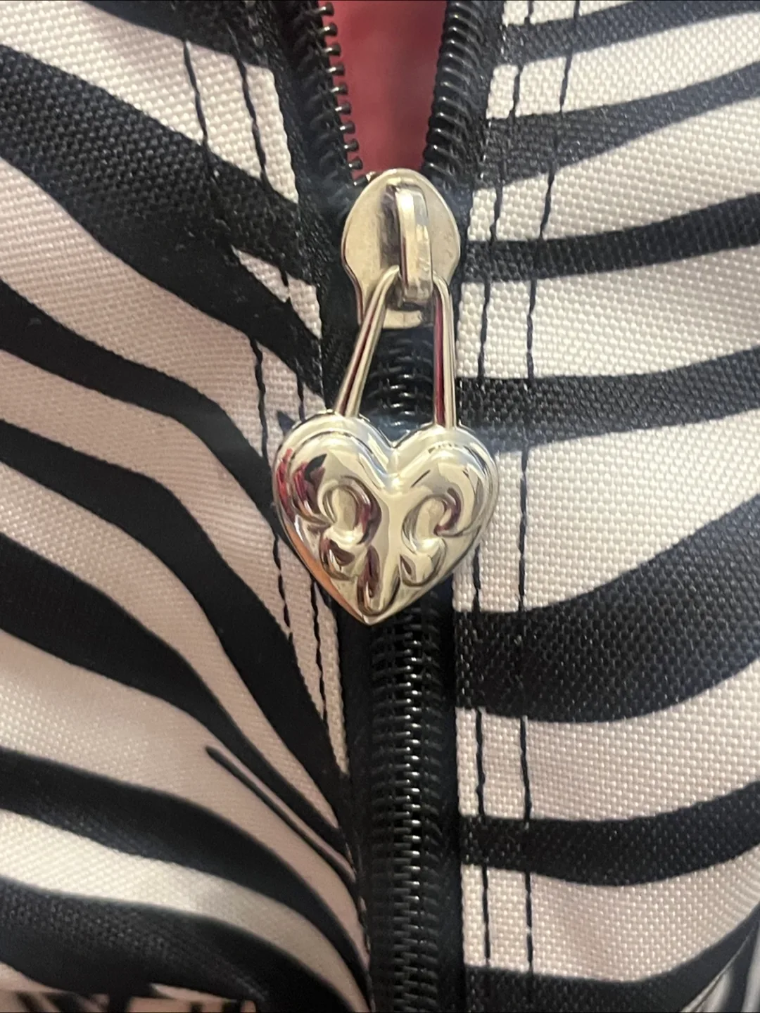 Kathy Van Zeeland Zebra Print Rolling Duffel Bag image indicator(4)