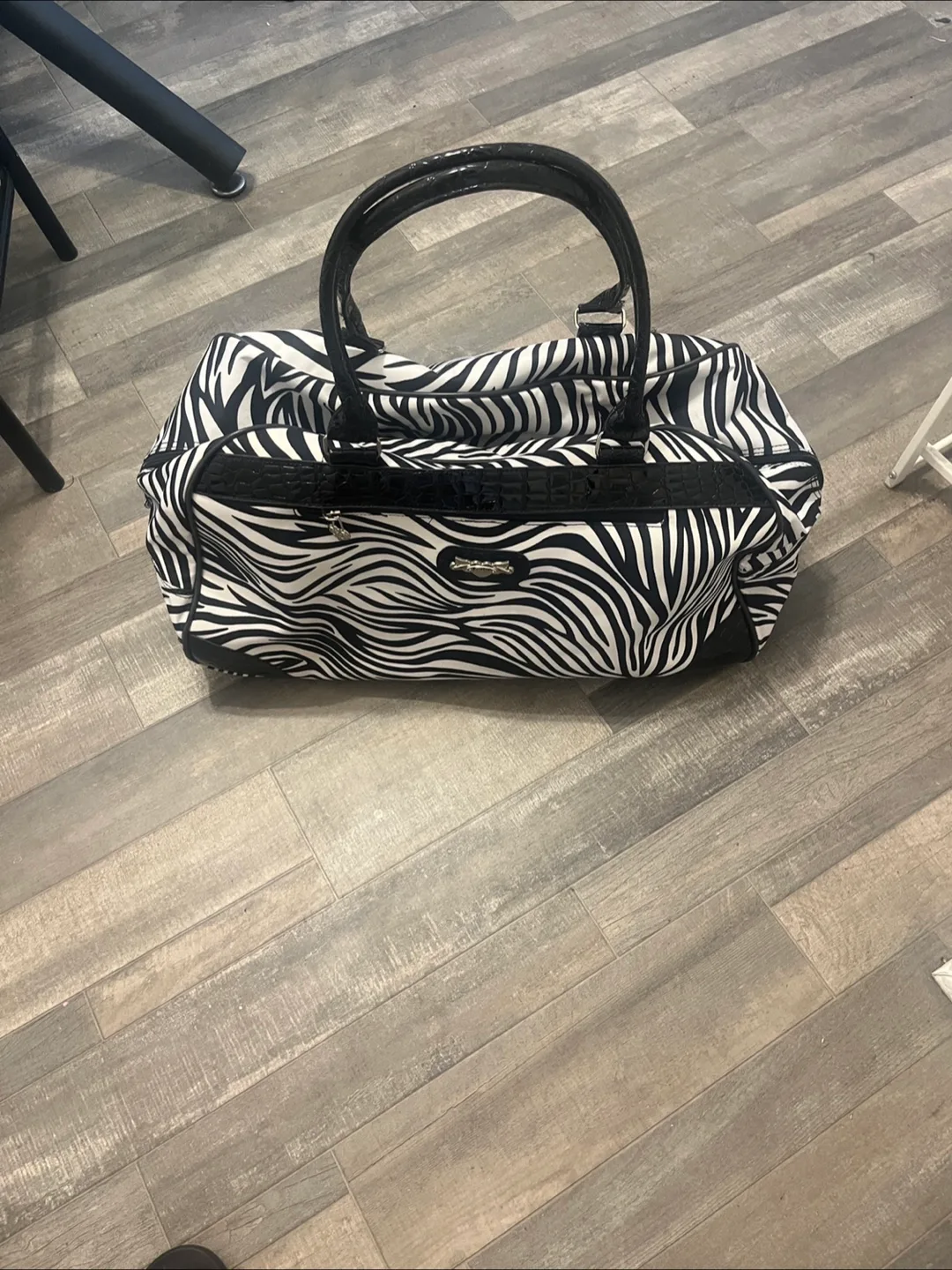 Kathy Van Zeeland Zebra Print Rolling Duffel Bag thumbnail