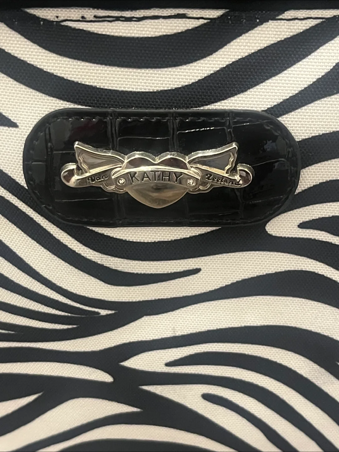 Kathy Van Zeeland Zebra Print Rolling Duffel Bag image indicator(2)