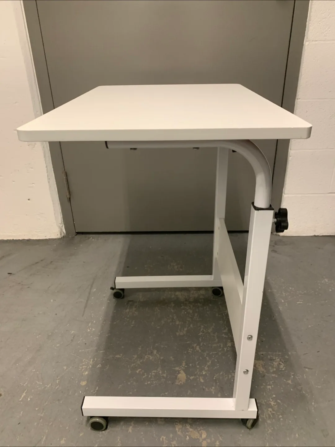 Adjustable Height White Rolling Table image indicator(2)