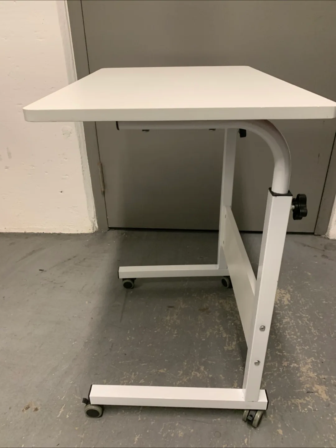 Adjustable Height White Rolling Table image indicator(7)