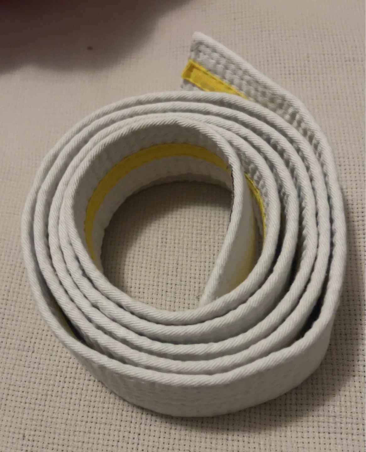 White and Yellow Martial Arts Belt thumbnail