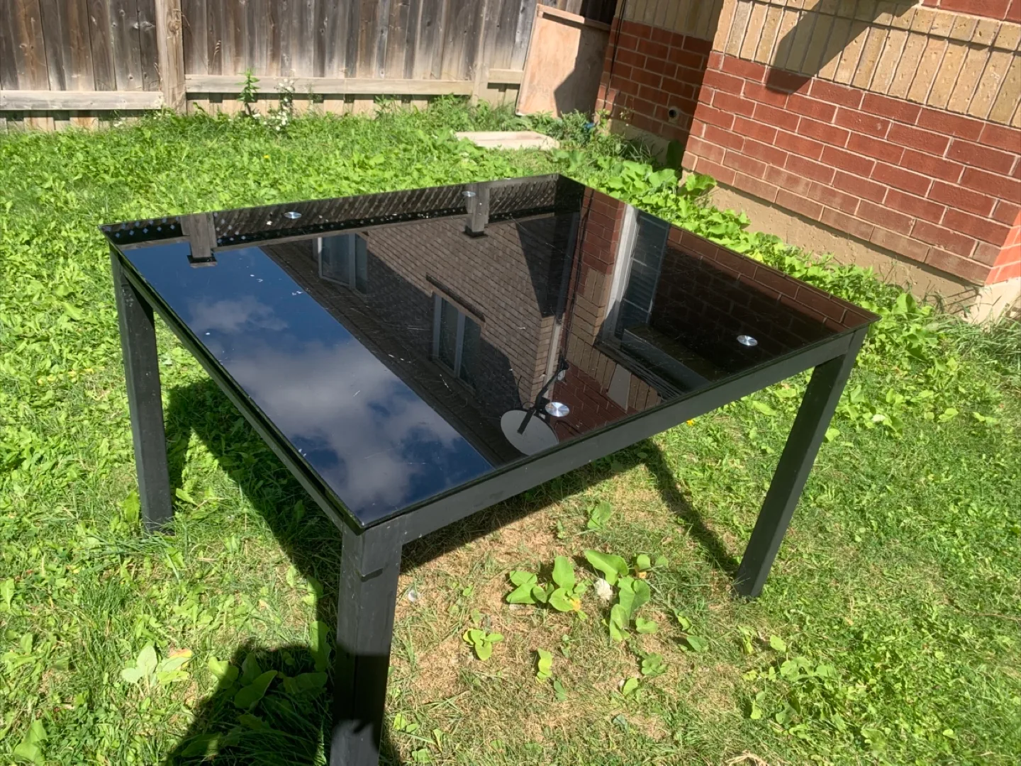 Black Glass Top Dining Table with 4 black chairs image indicator(2)