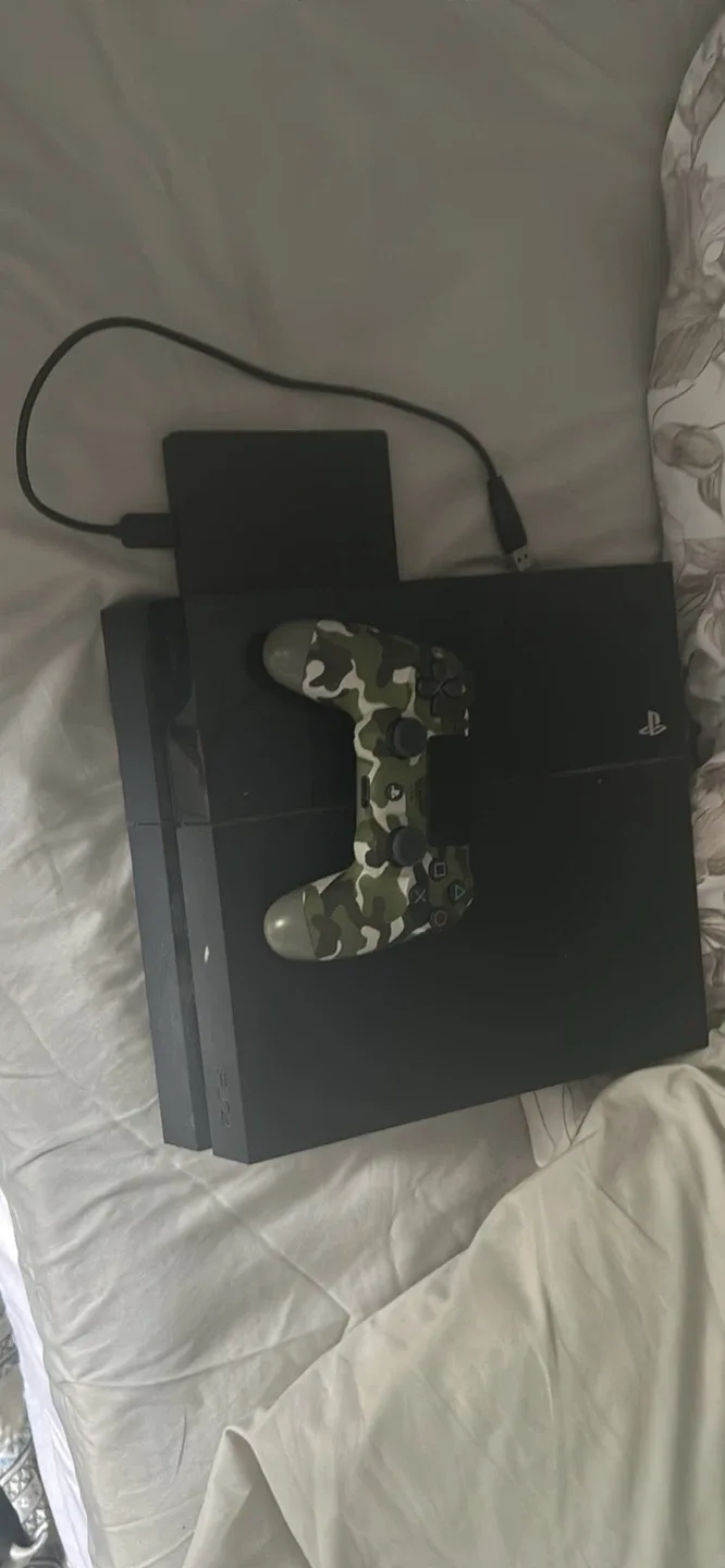 PlayStation 4 with Camo Controller and 1Tb extra storage thumbnail