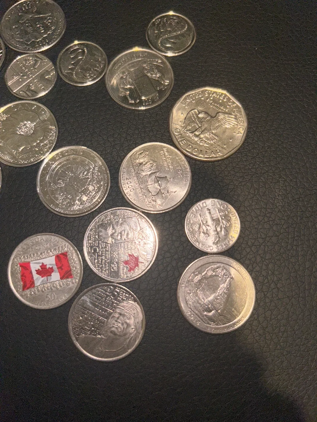 Assorted coins from Canadian money to American image indicator(2)