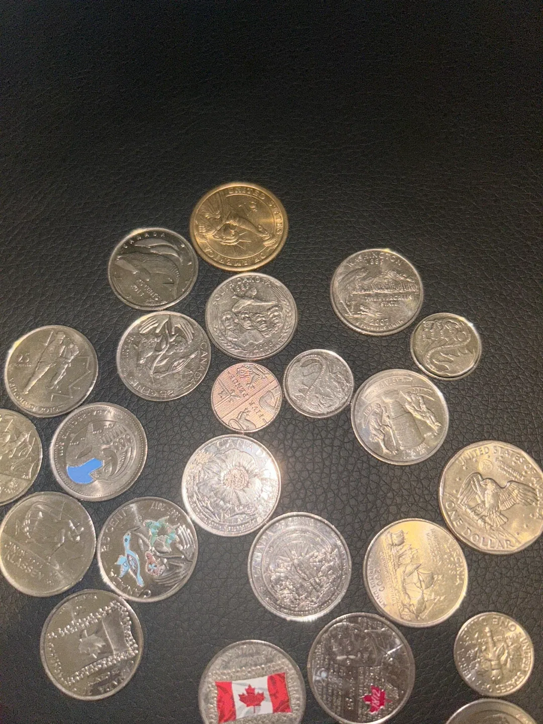 Assorted coins from Canadian money to American image indicator(4)