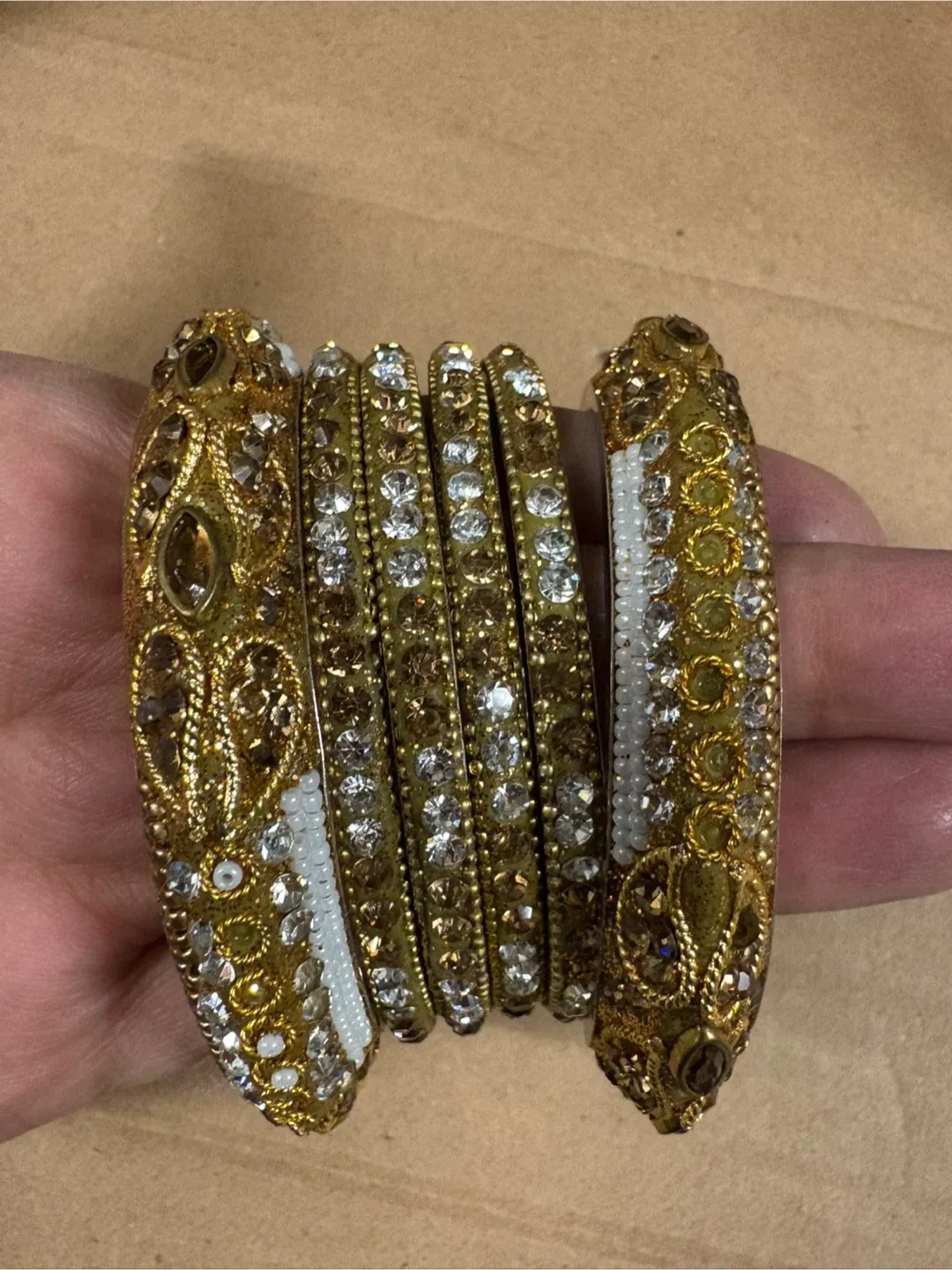 Gold-tone embellished bangle set image indicator(2)