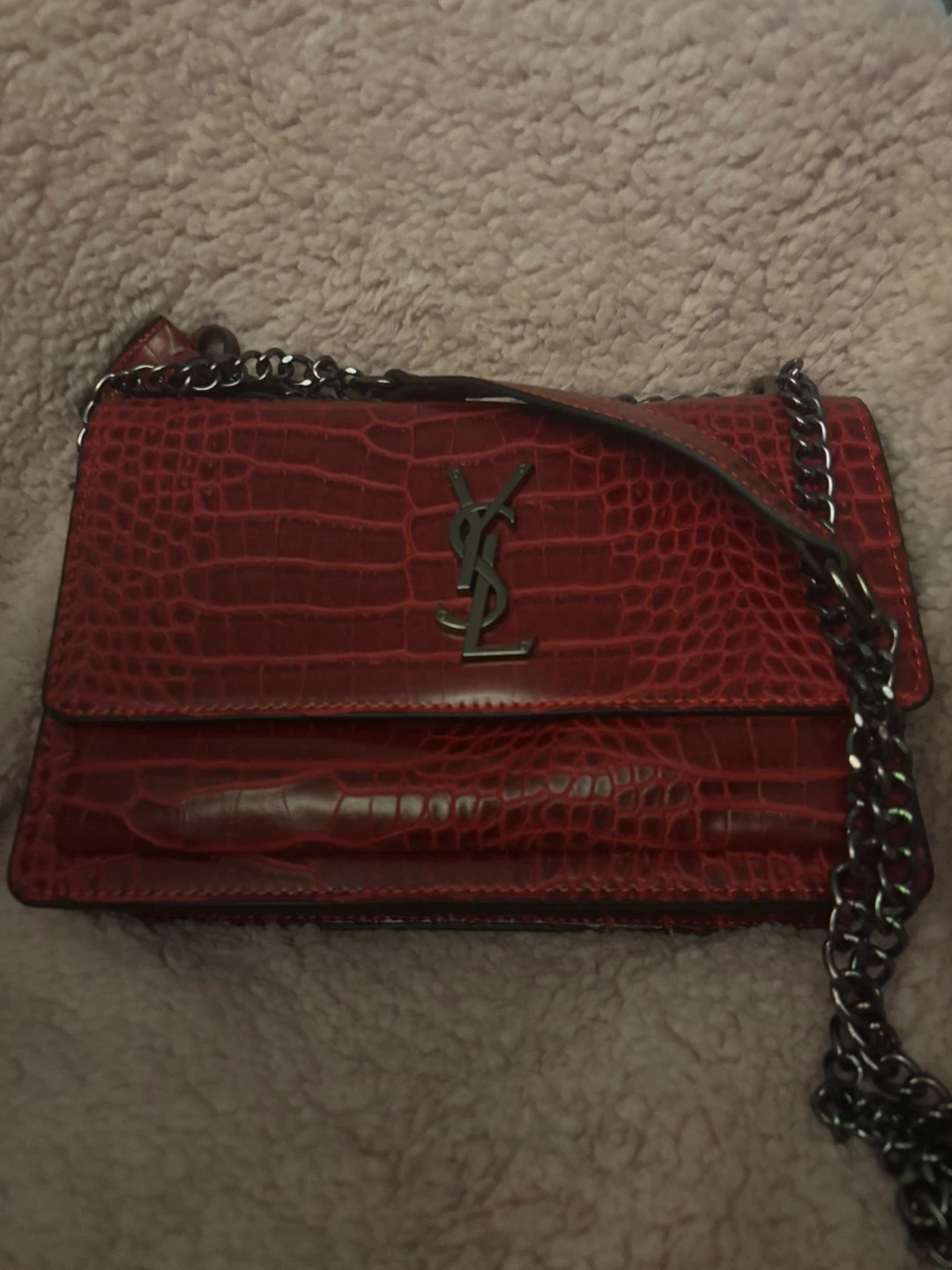 Red leather handbag