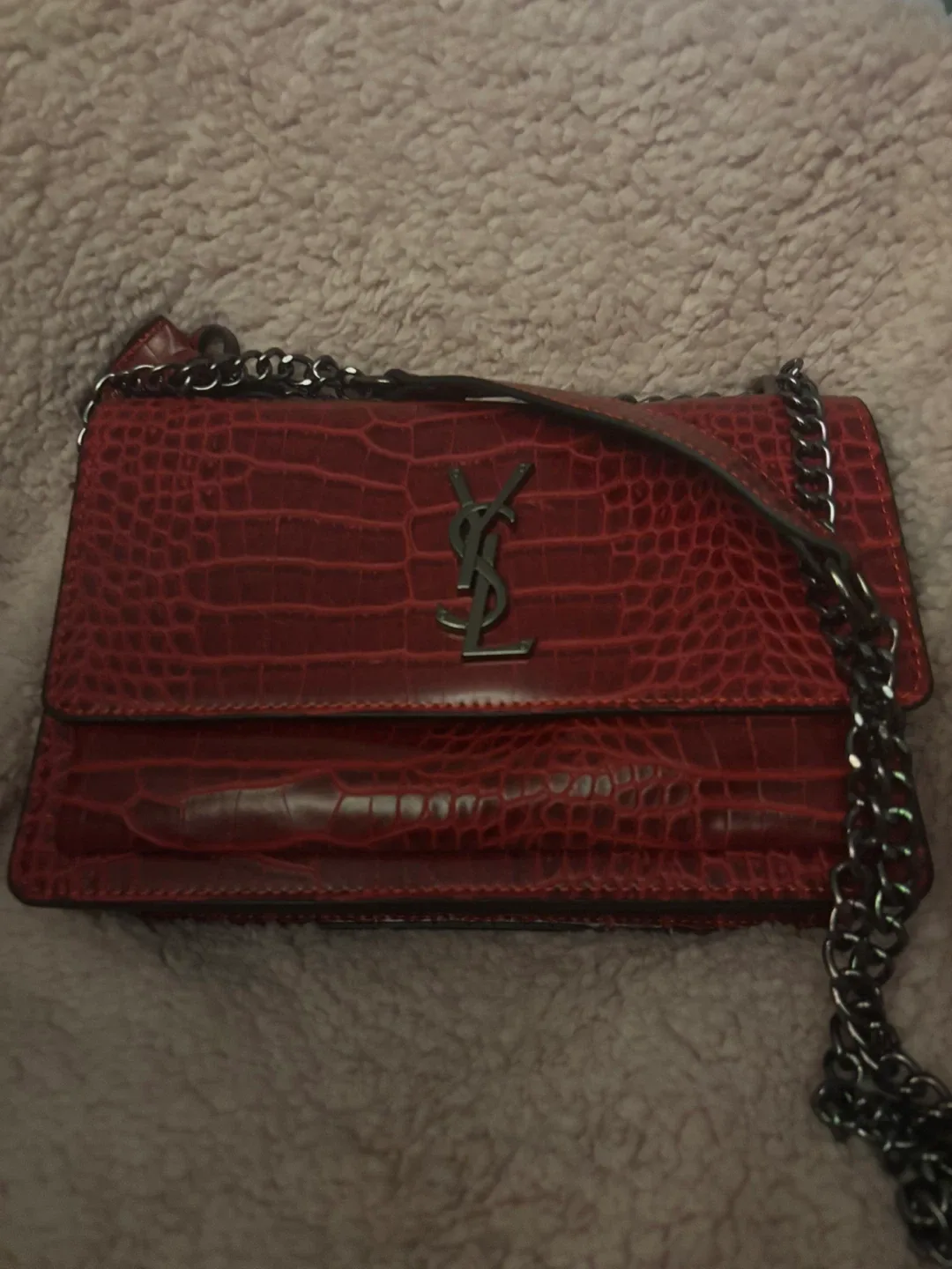 Red leather handbag thumbnail