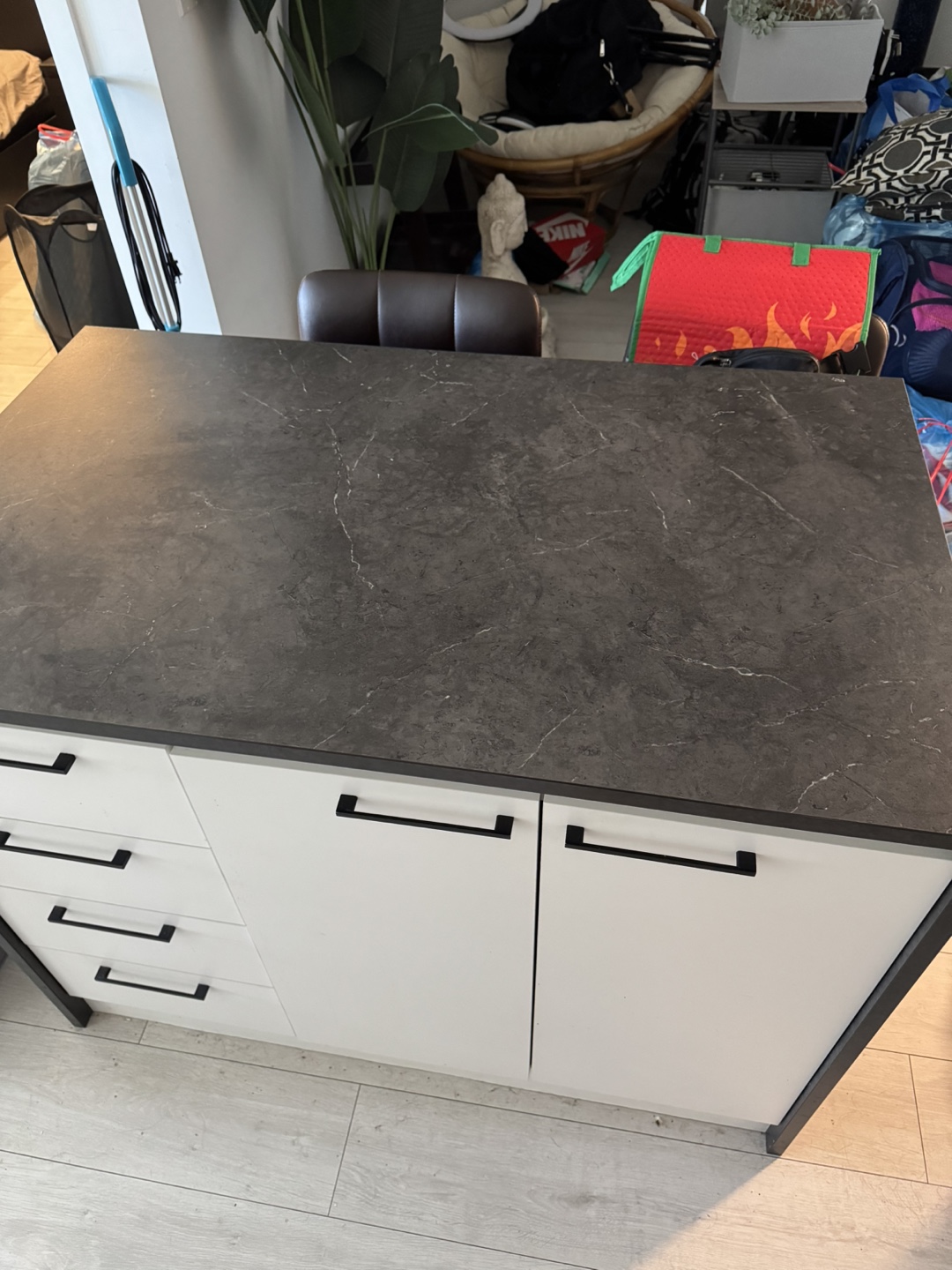 Kitchen Island with White Cabinets and Dark Countertop - photo 3