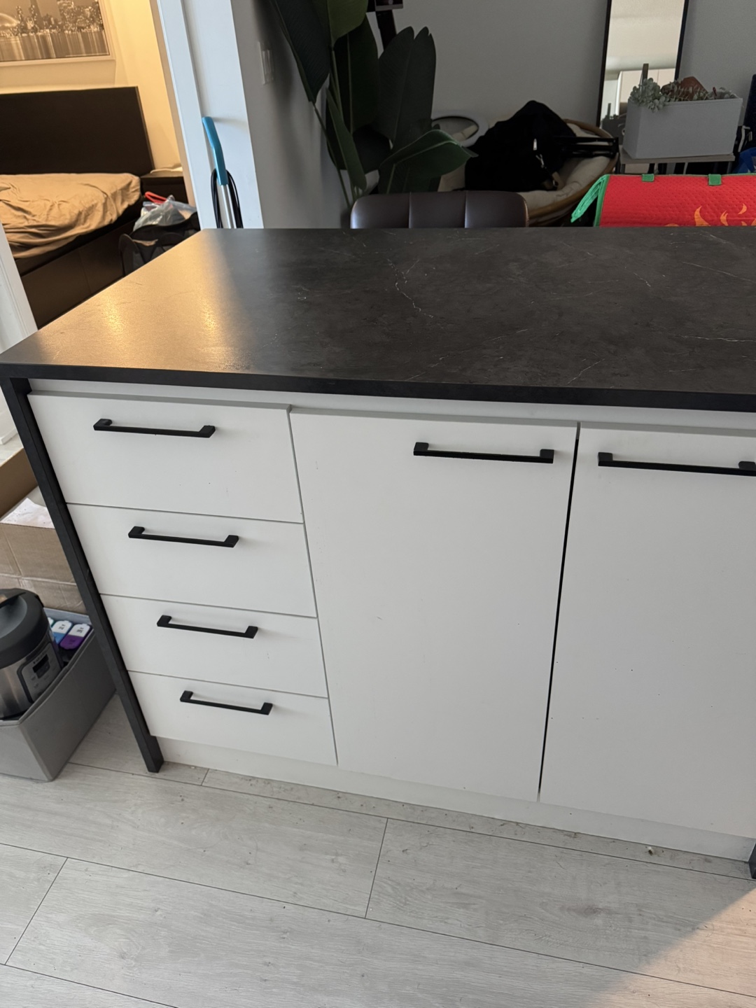 Kitchen Island with White Cabinets and Dark Countertop - photo 2