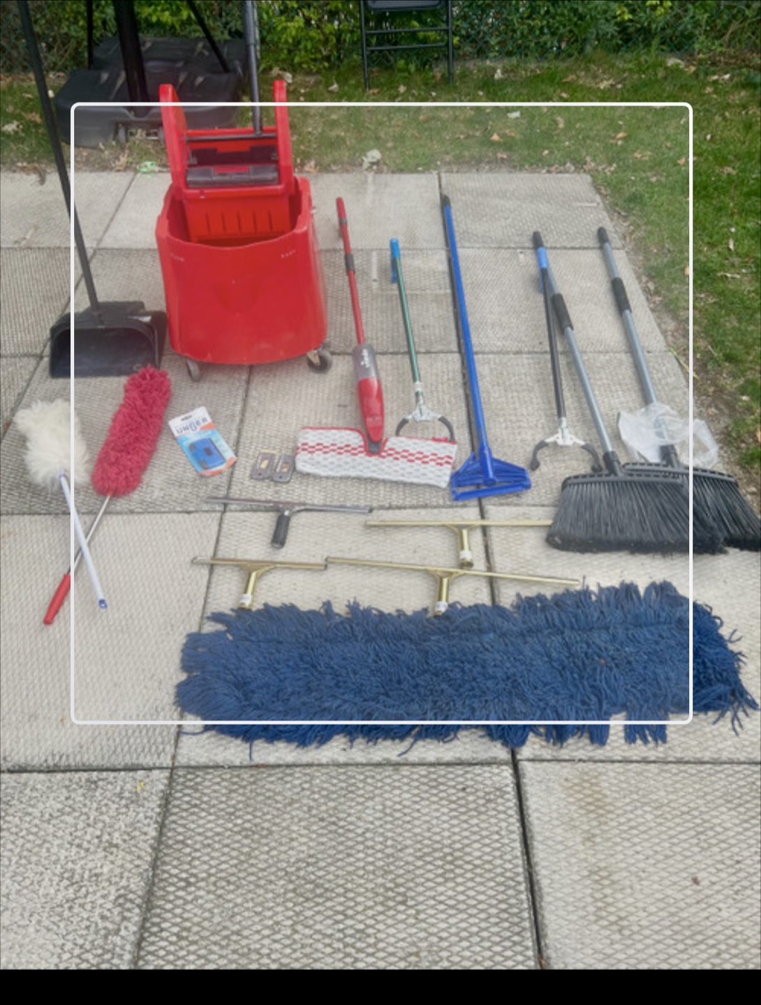 Variety of Mops and Cleaning Supplies