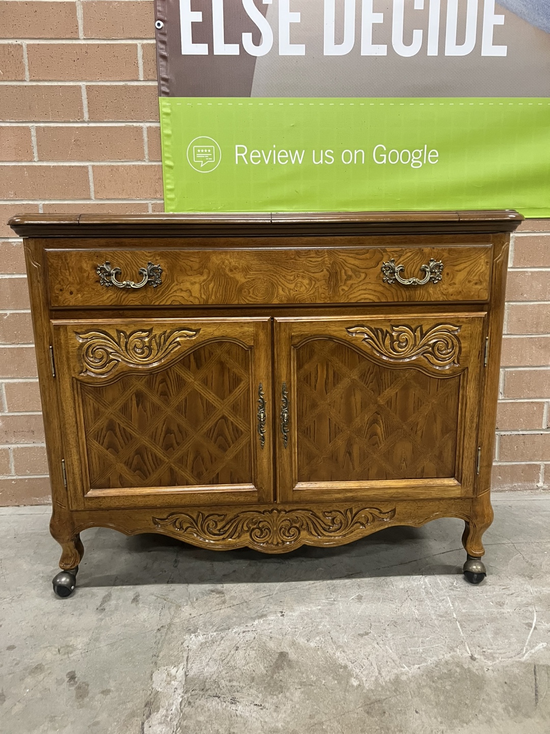 Cabinet with open Leaf Extensions, rolls on casters