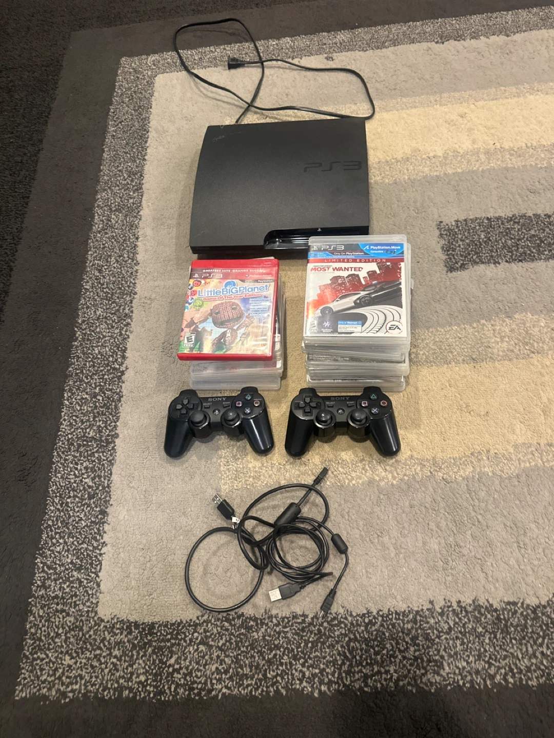 PlayStation 3 (PS3) with Games and Controllers