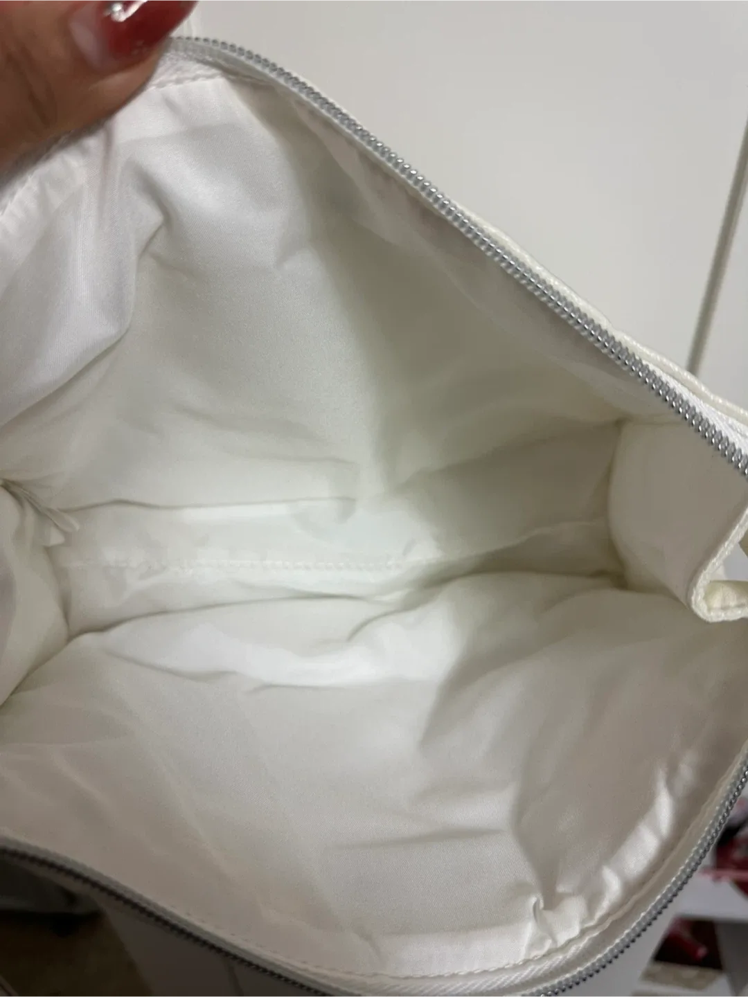 Holt Renfrew White Padded Pouch image indicator(3)