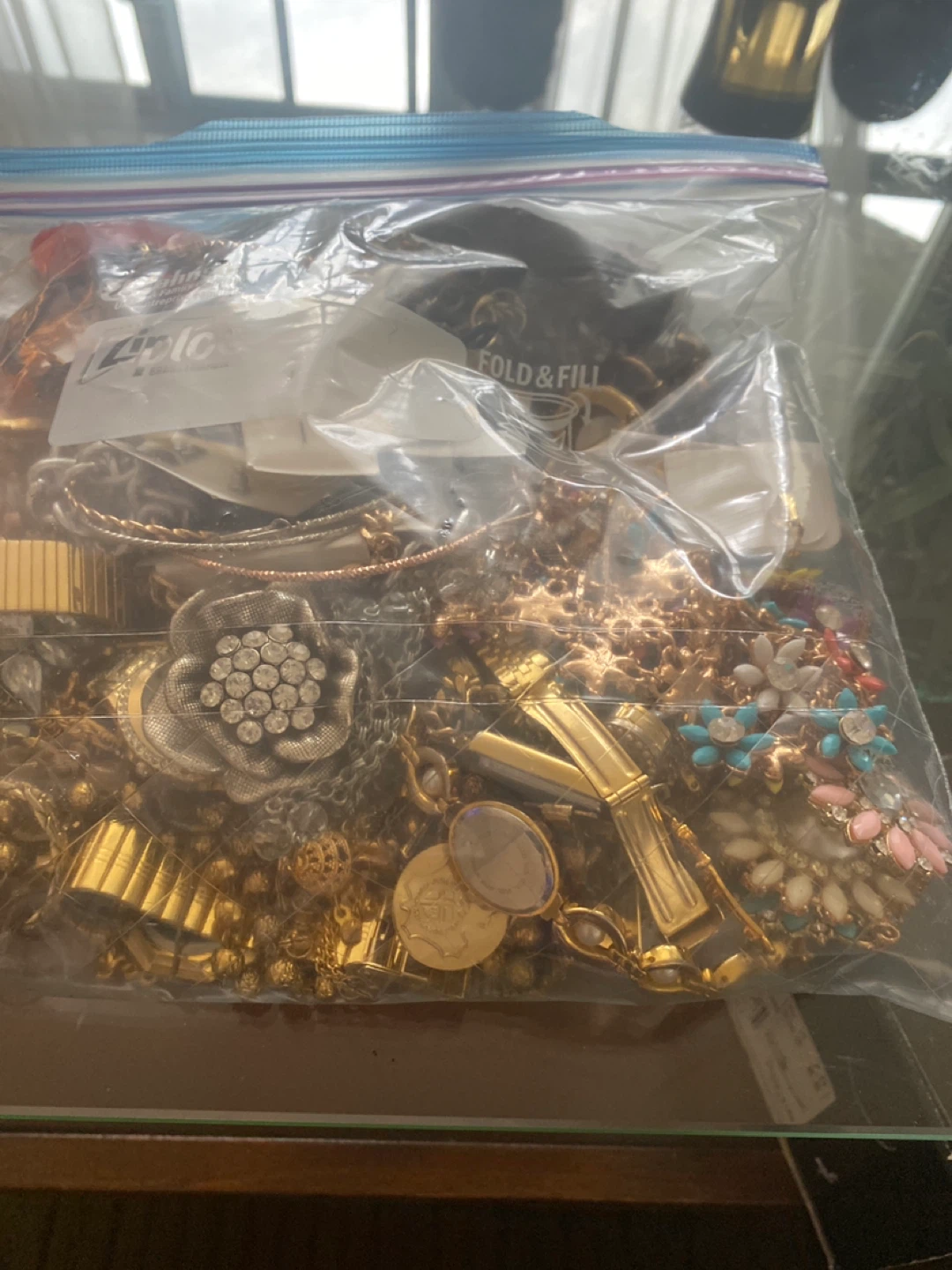 Bag of assorted jewelry