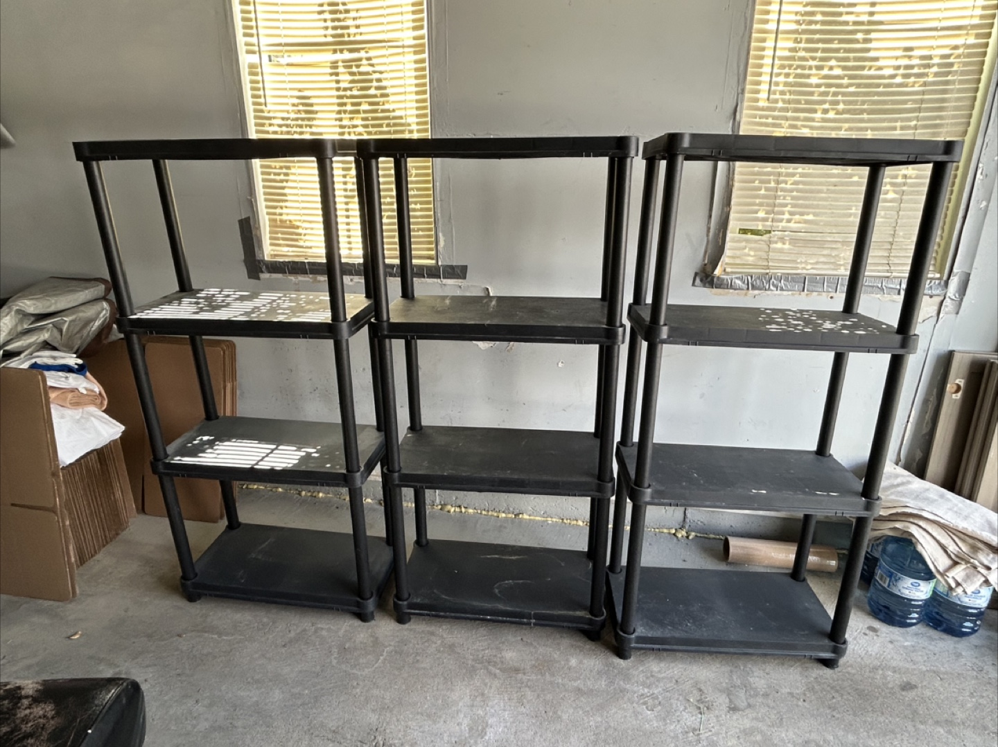 2 Black Plastic Shelving Units