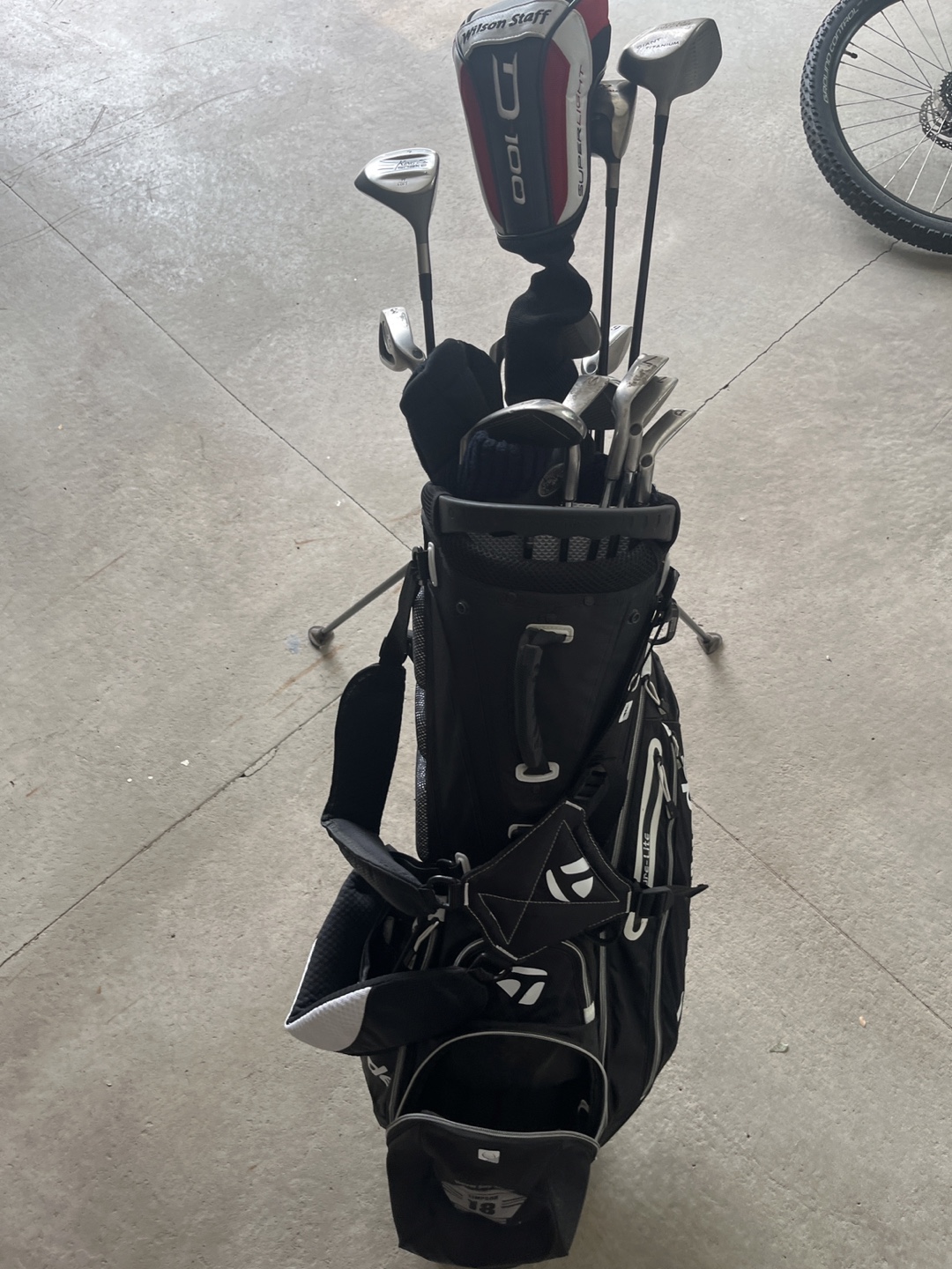 Golf  bag with lots of stuff