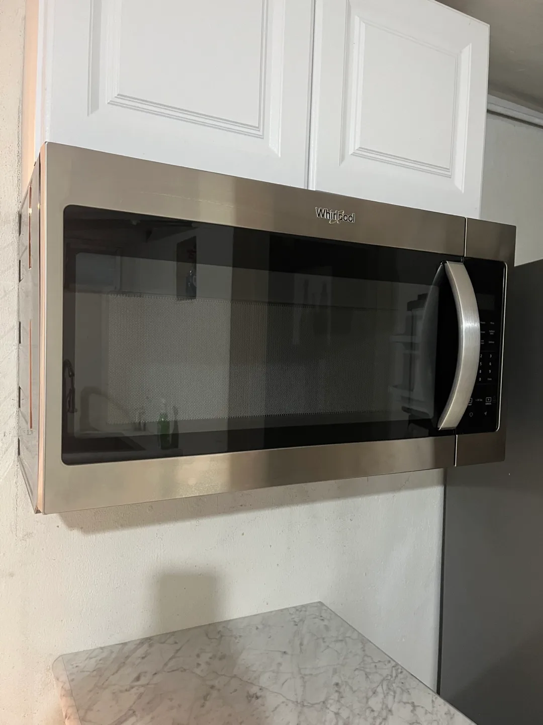 Whirlpool 1.7 cu. ft. Over the Range Microwave image indicator(4)