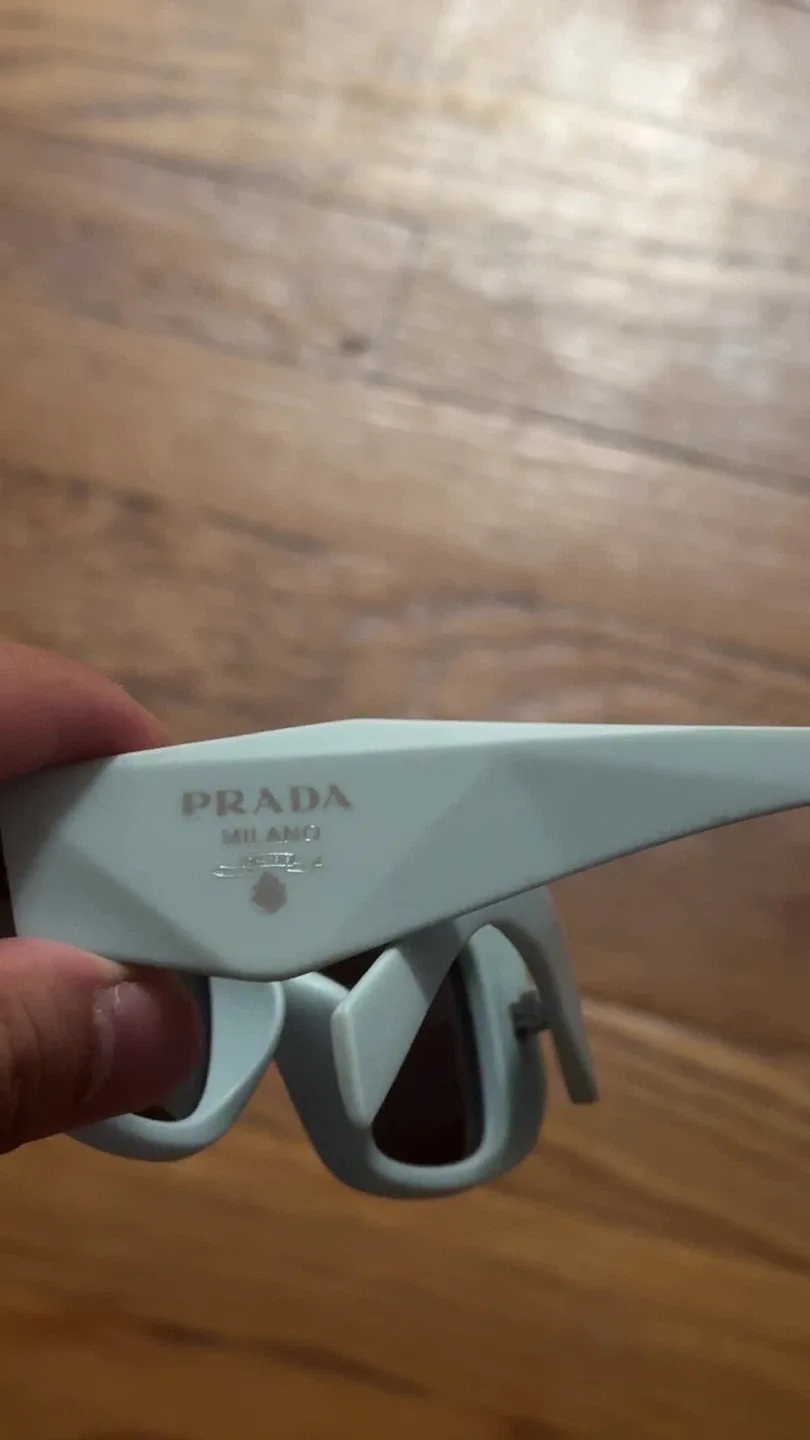 Prada Sunglasses Light Blue image indicator(2)