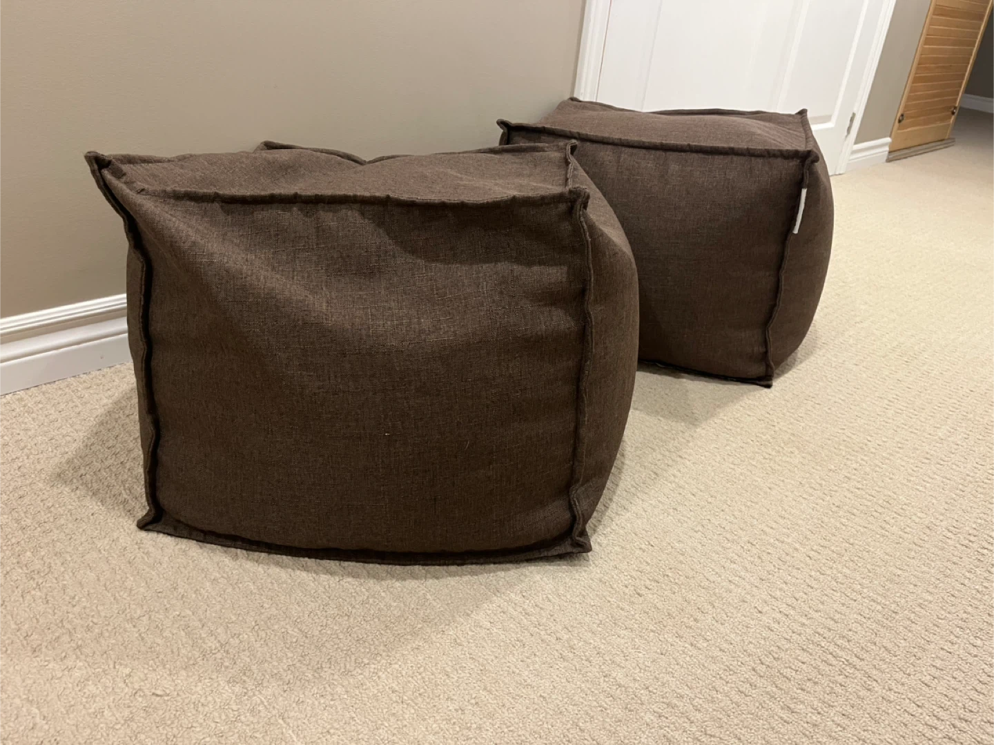 Two Brown Poufs