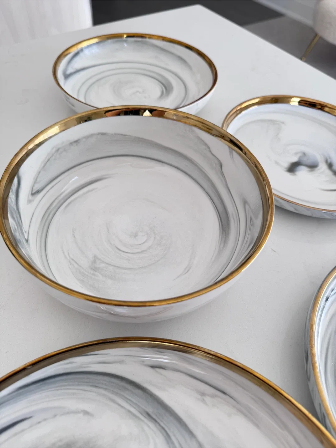 Marble Patterned Dinnerware Set with Gold Trim image indicator(3)