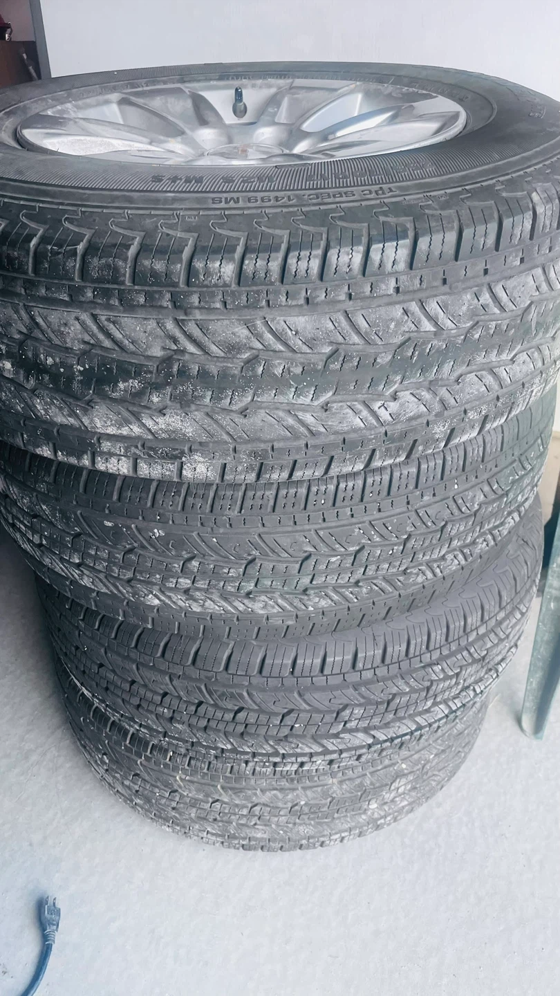 Set of 4 235/70R17 Tires on Chevy Rims