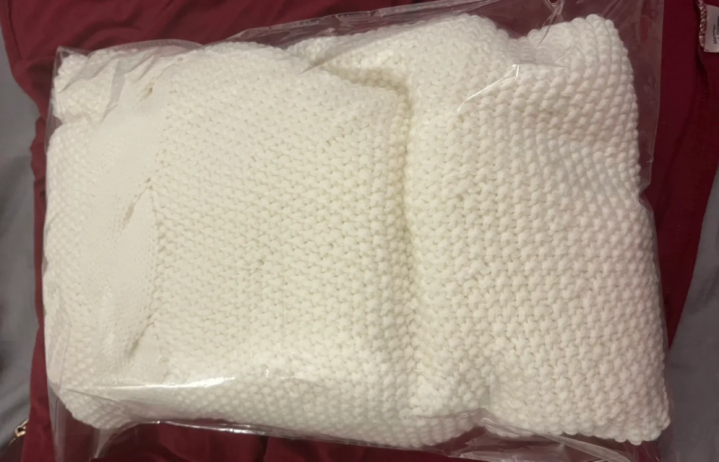 Cream Knit Cape with Pom Poms image indicator(9)