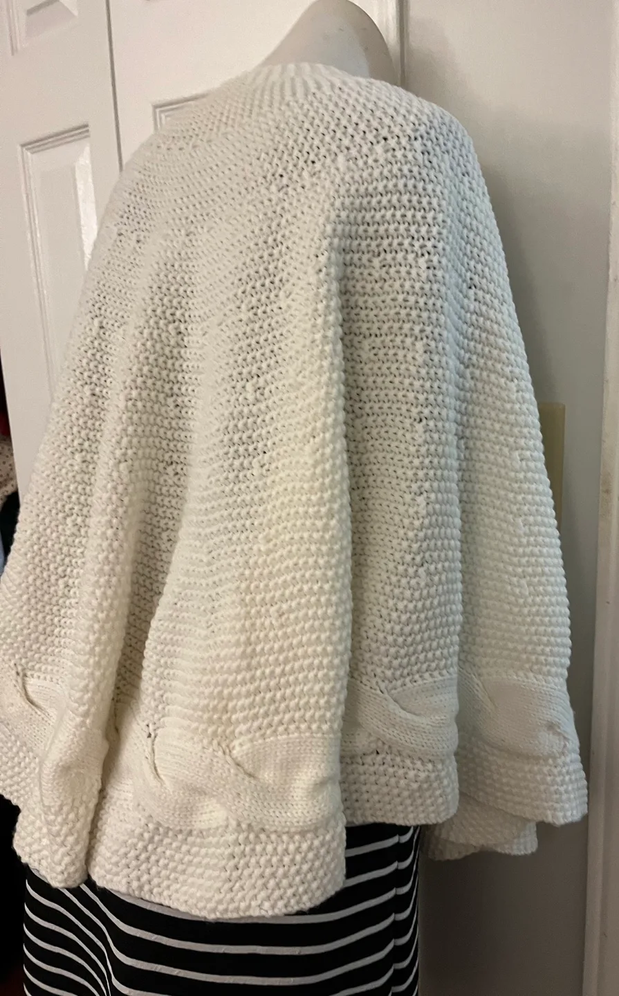 Cream Knit Cape with Pom Poms image indicator(4)