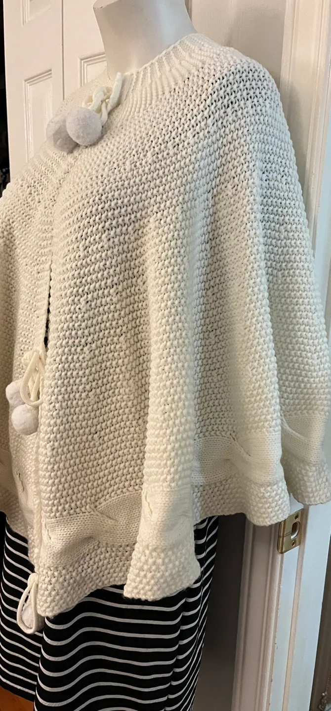 Cream Knit Cape with Pom Poms image indicator(2)