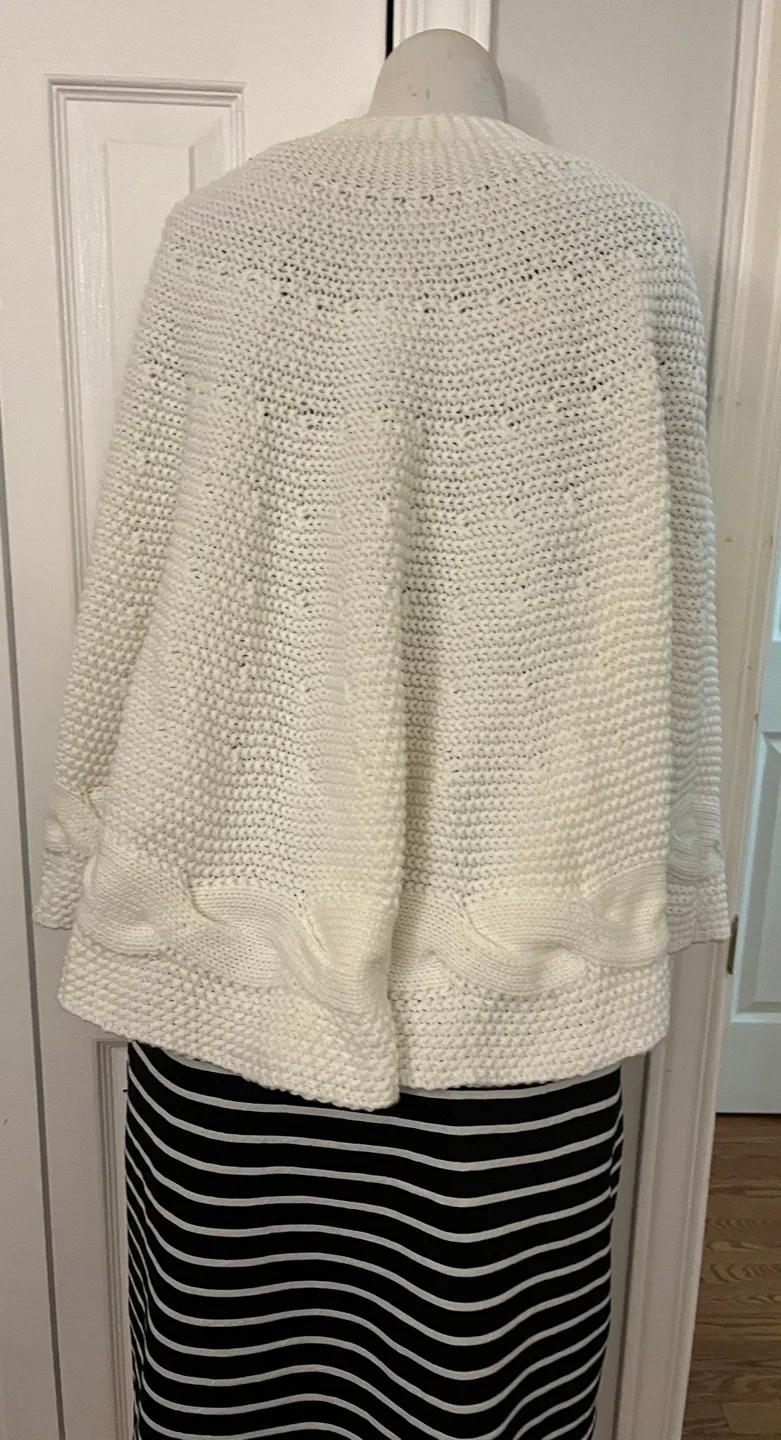 Cream Knit Cape with Pom Poms image indicator(7)