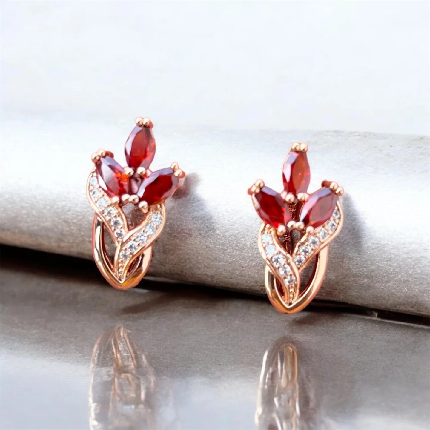 Red zircon Flower Earrings. Rose gold plated thumbnail