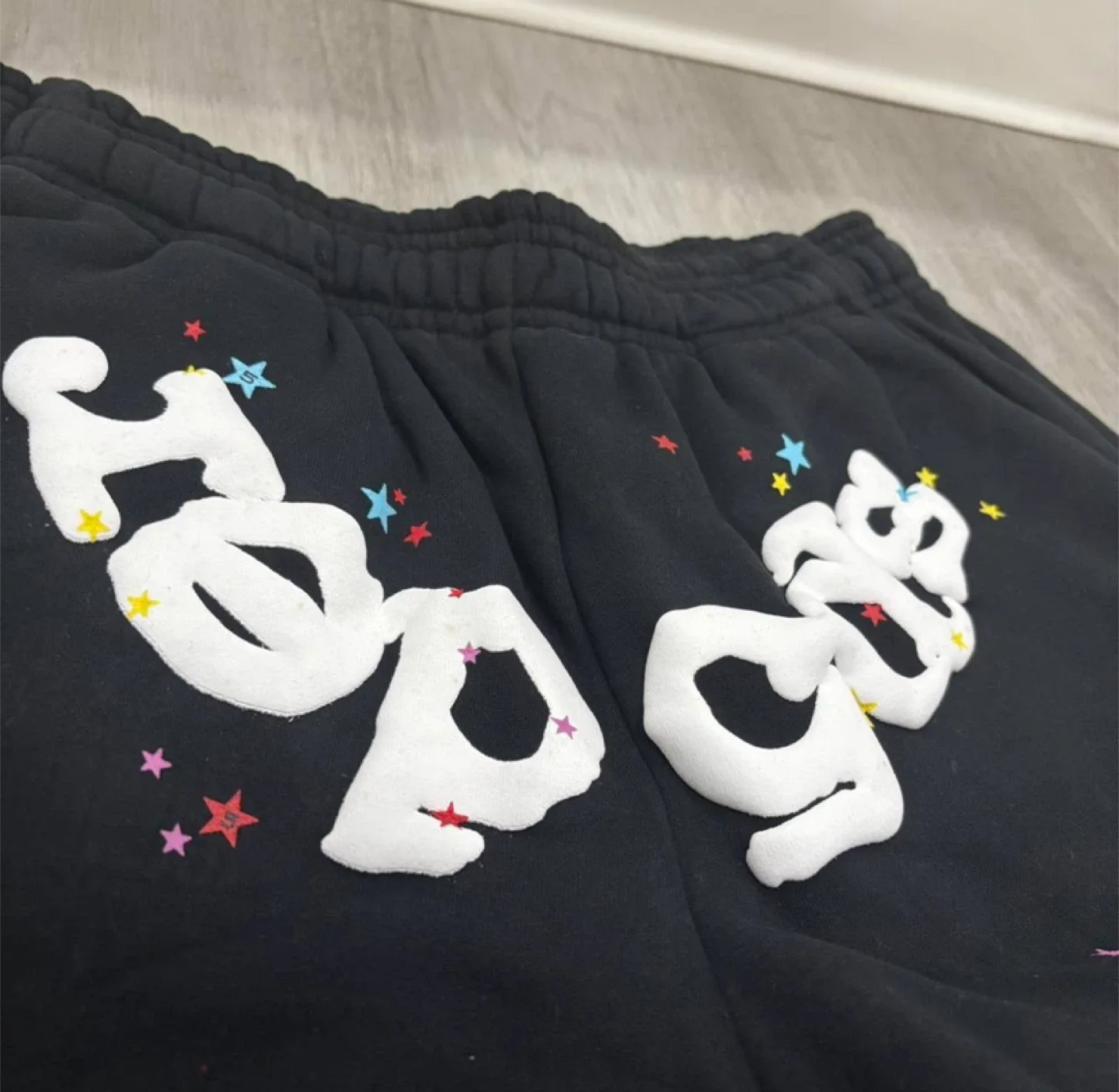 Sp5der Worldwide Black Logo Sweatpants With Colorful Stars image indicator(5)