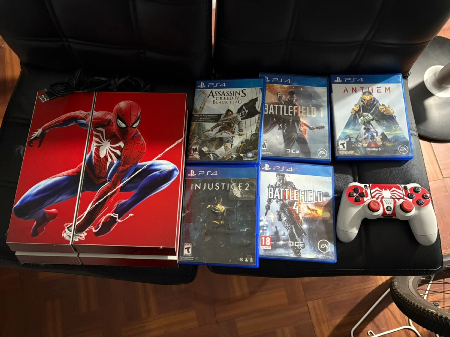 PlayStation 4 with Spiderman Skin and Games