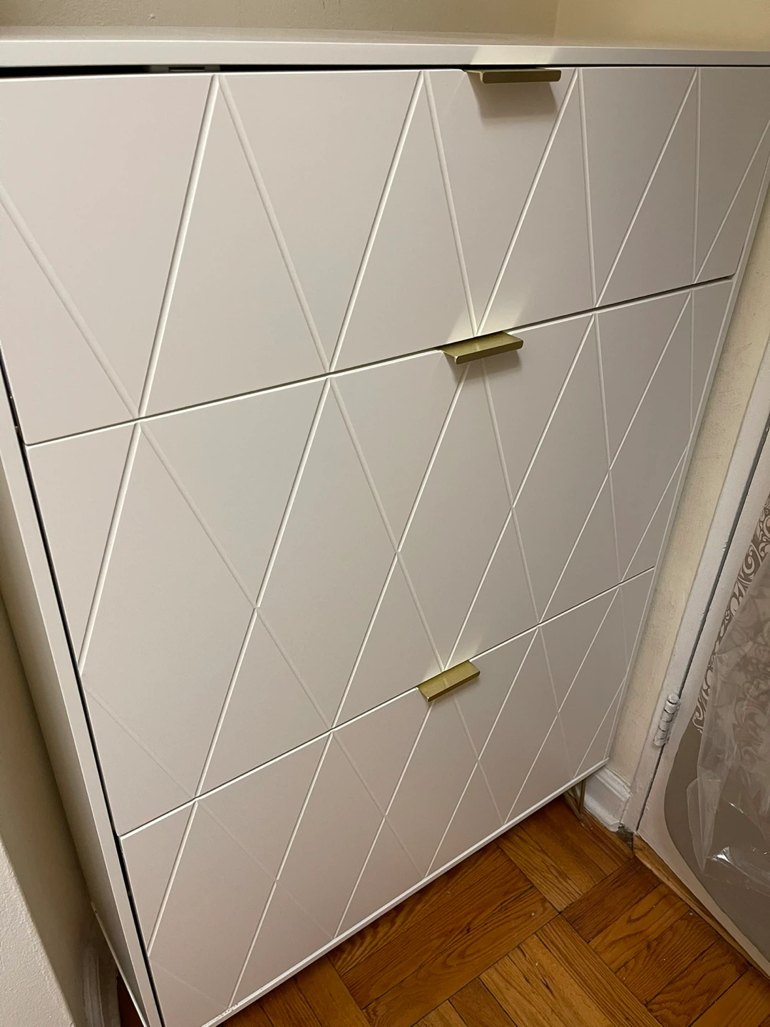 White & Gold Shoe Cabinet with Geometric Design