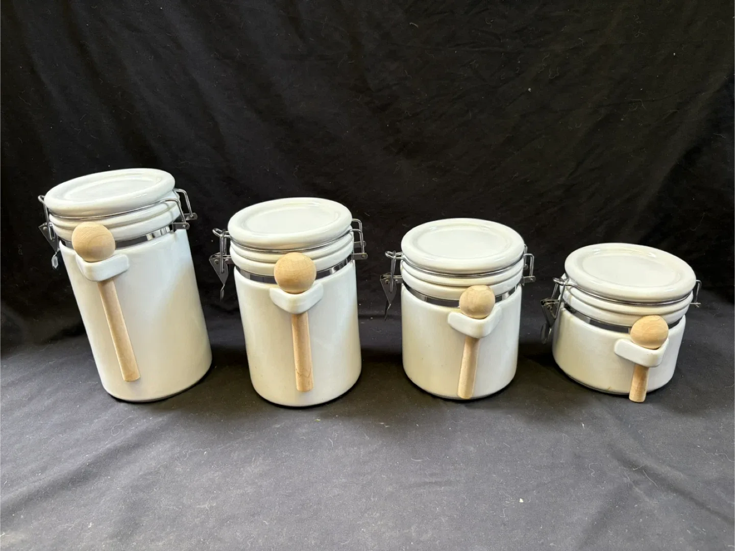 White Ceramic Canister Set with Wooden Spoons thumbnail