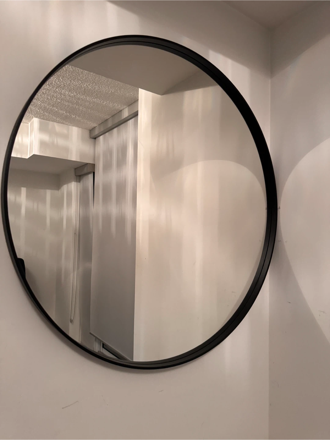 Round Black Framed Mirror
