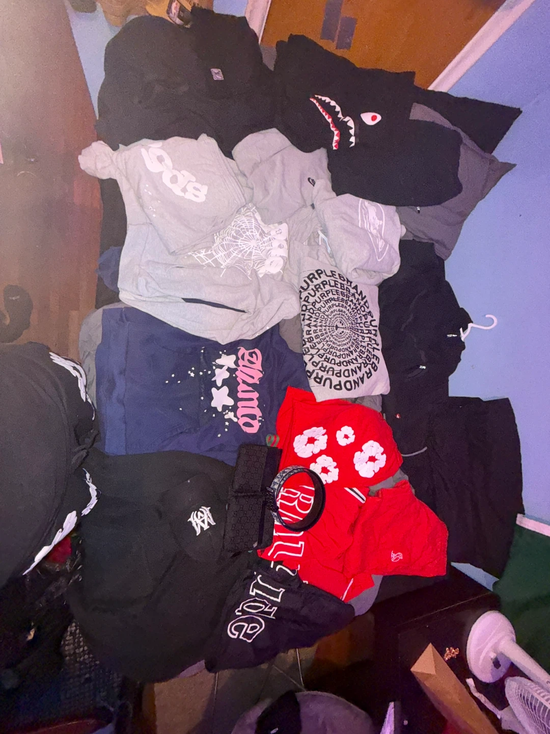 A bunch of designer clothes