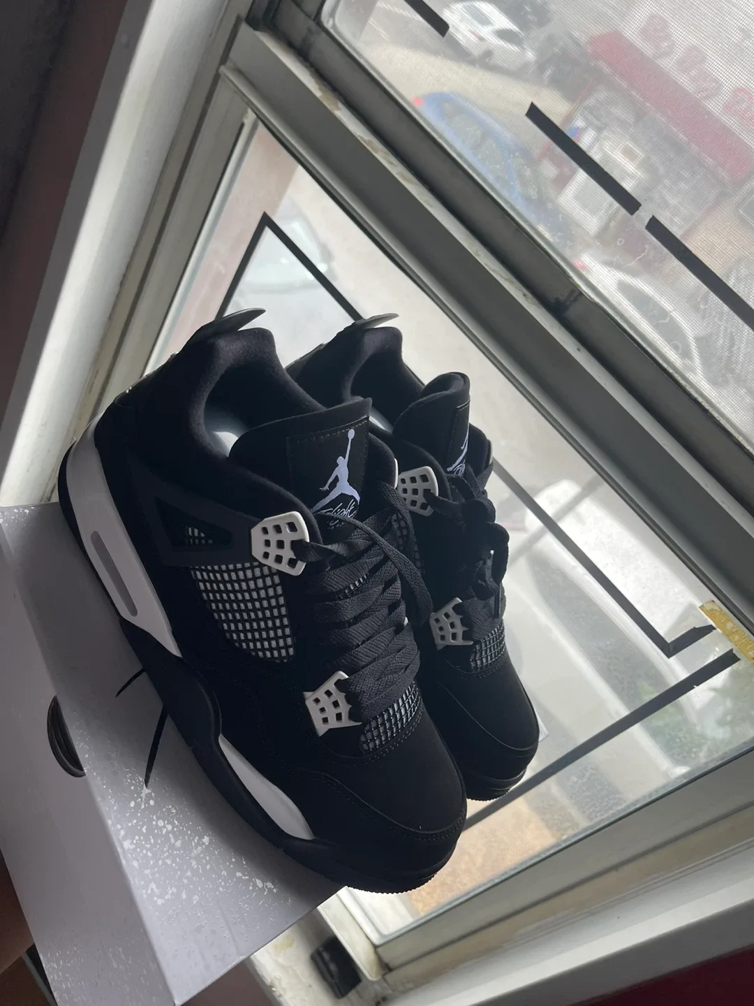Air Jordan 4 Retro Black US 10 image indicator(2)