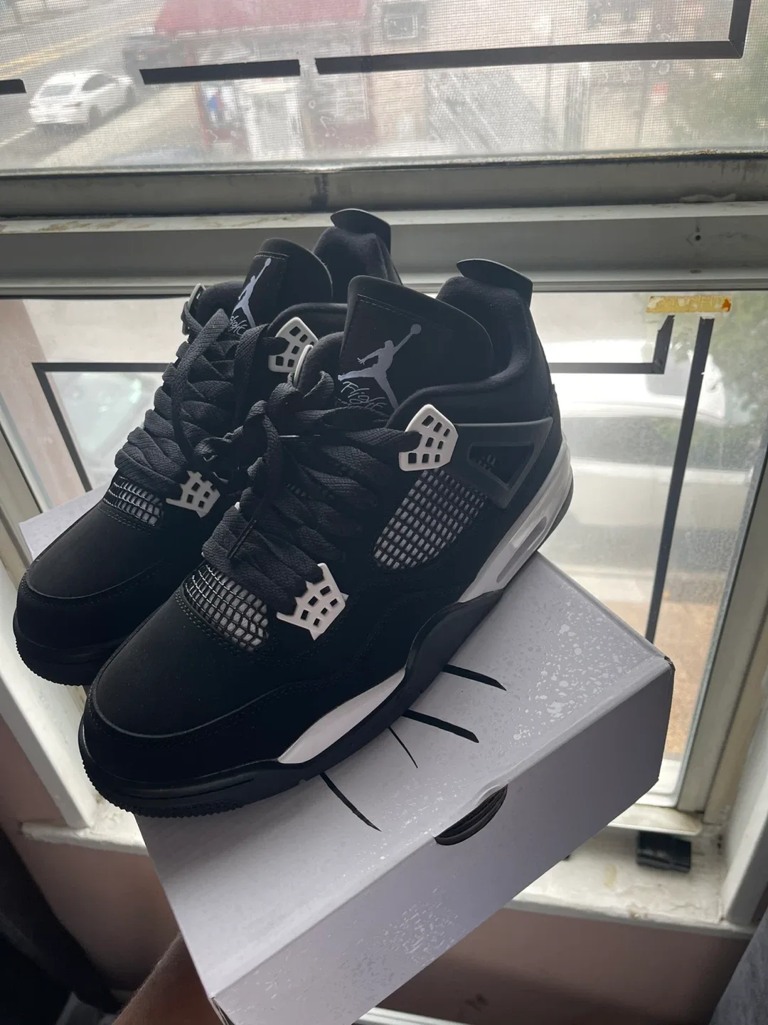 Air Jordan 4 Retro Black US 10 image indicator(3)