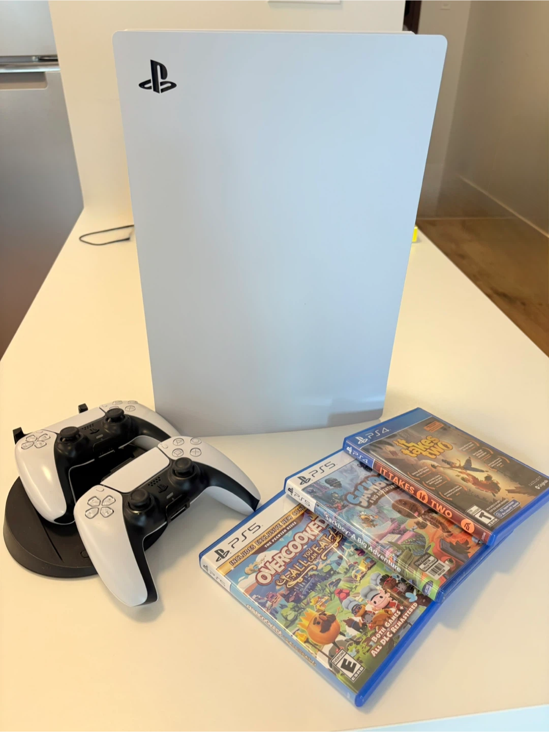 PS5 disc edition with controllers and co-op games