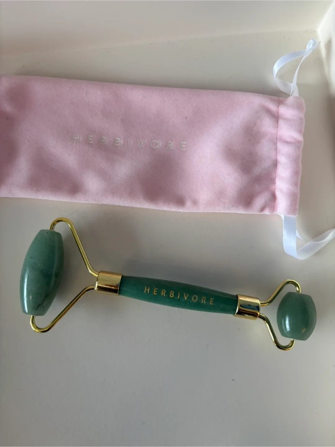 Jade Facial Roller with Pouch by Herbivore (like new) thumbnail