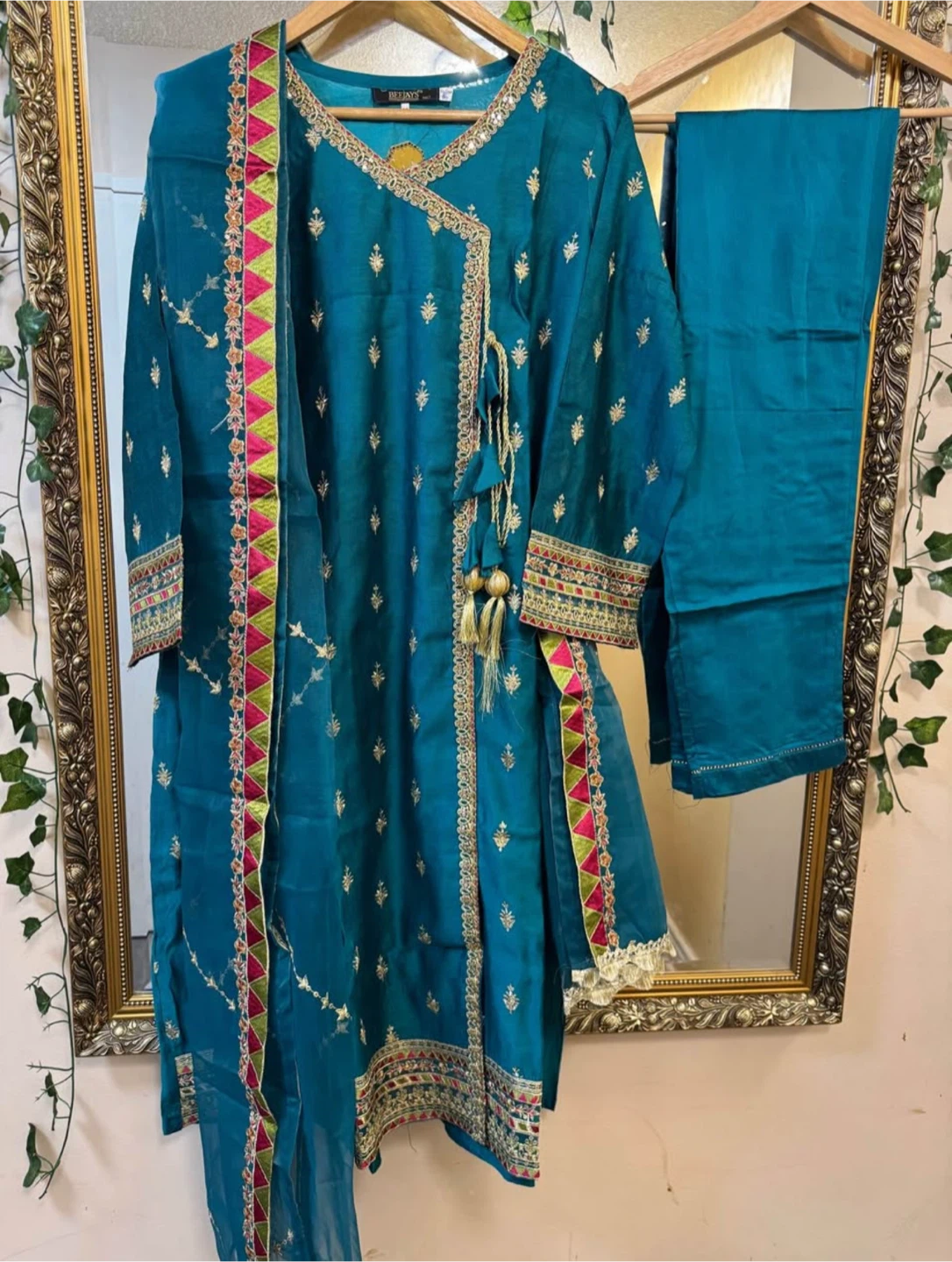 New Teal Embroidered khaadi net suit