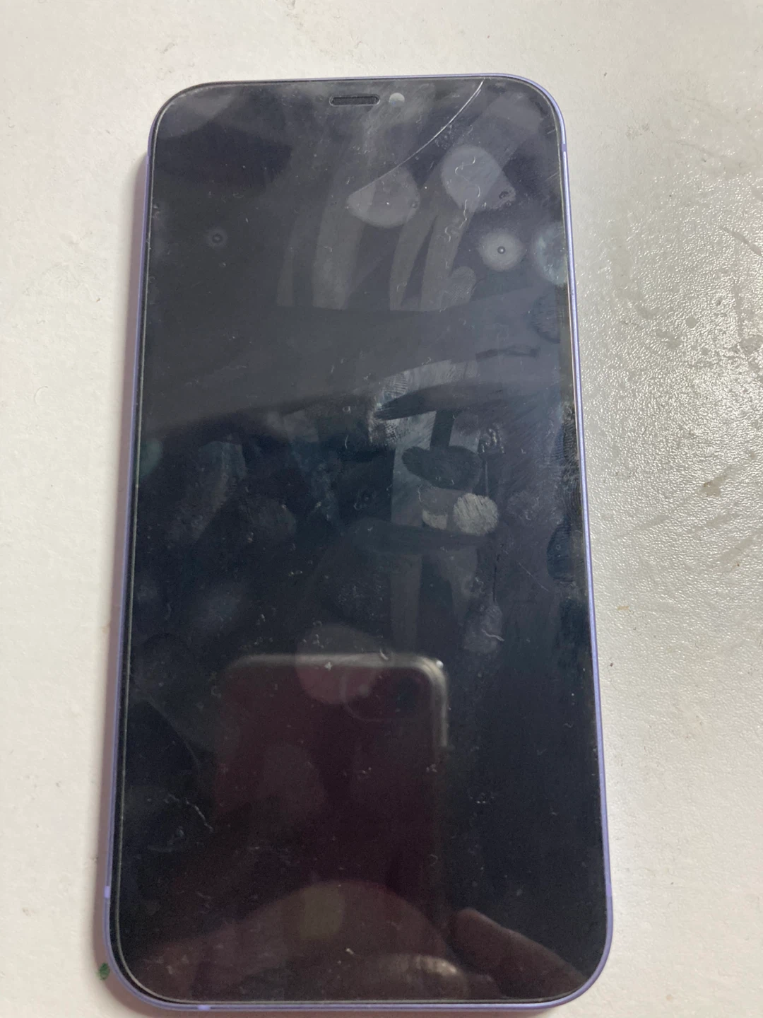 Purple iPhone 12 (Cracked)