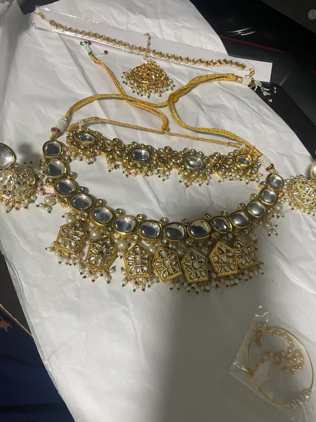 Kundan Jewellery Set - Necklace, Earrings, Tikka, Nath thumbnail