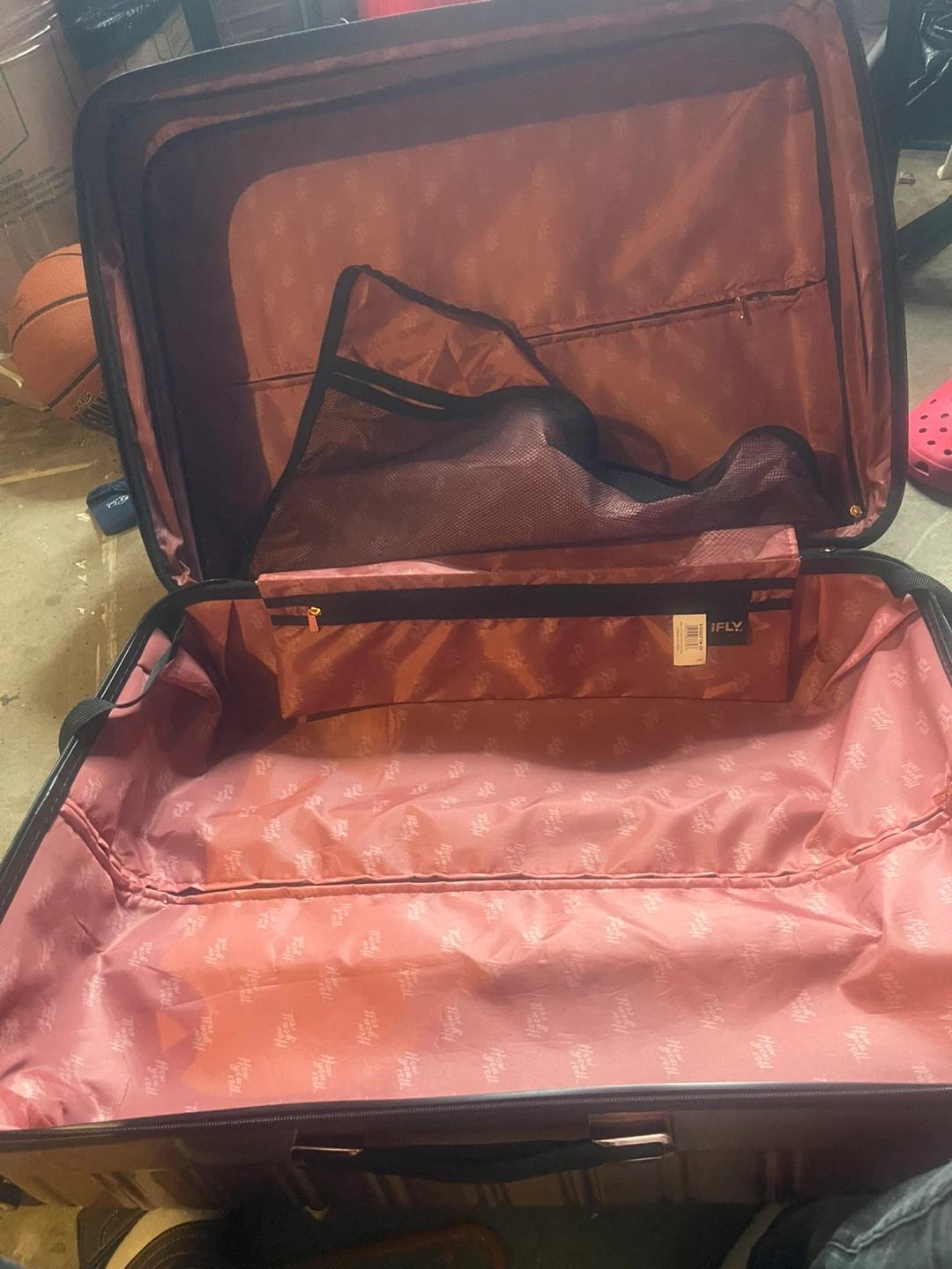 iFLY Rose Gold Hardside Spinner Suitcase